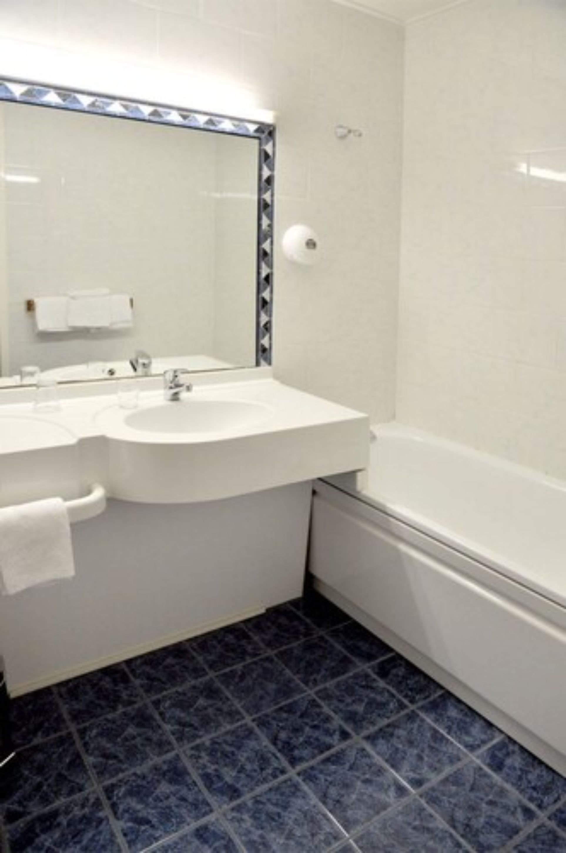 standard double room | bathroom | bathtub, hair dryer, towels