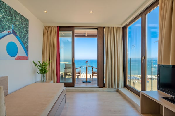 Deluxe Suite, Sea View | Premium bedding, in-room safe, desk, blackout drapes