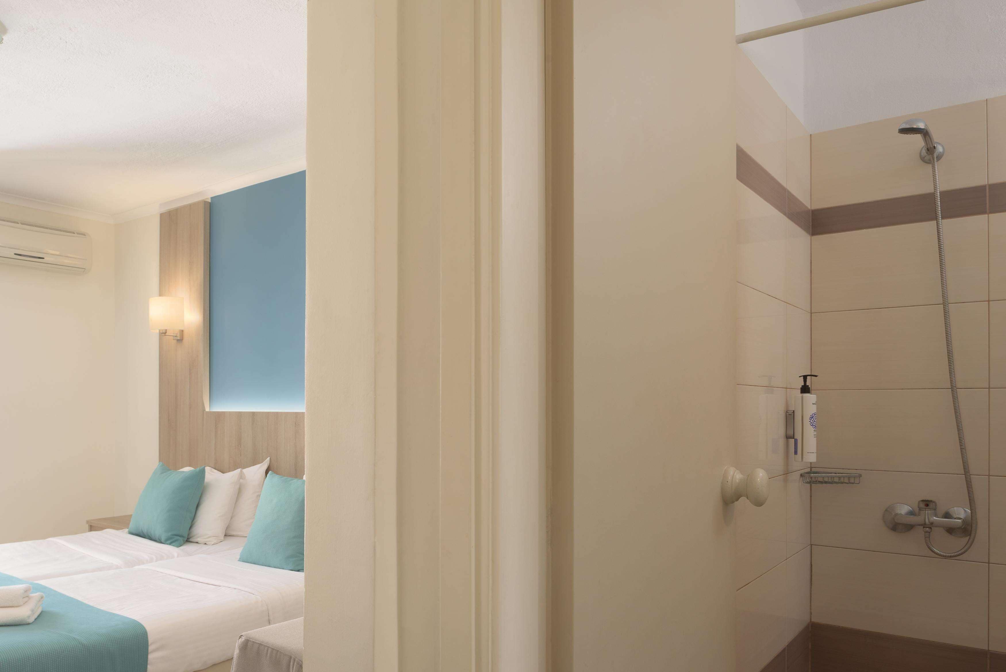 superior room | bathroom | hair dryer, towels