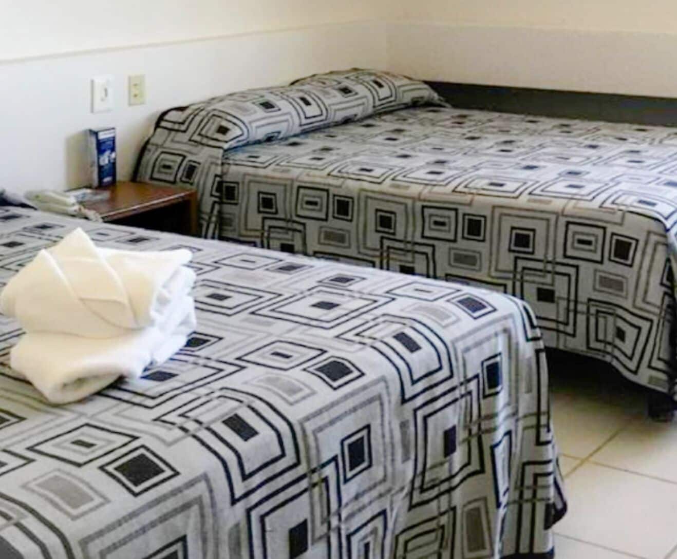 basic double room, 2 double beds | in-room safe, iron/ironing board, free wifi