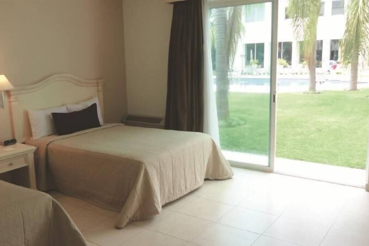 Desk, iron/ironing board, cribs (free), WiFi (free)