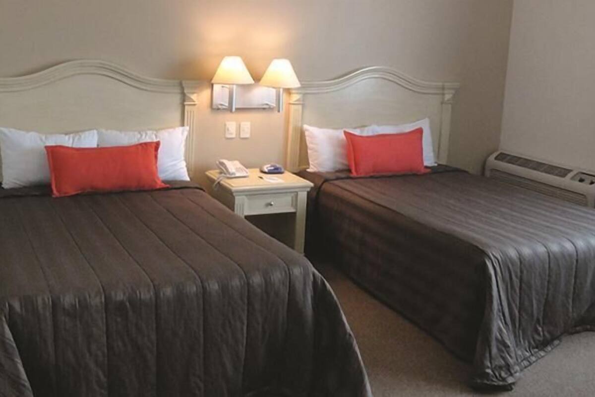 Desk, iron/ironing board, cribs (free), WiFi (free)