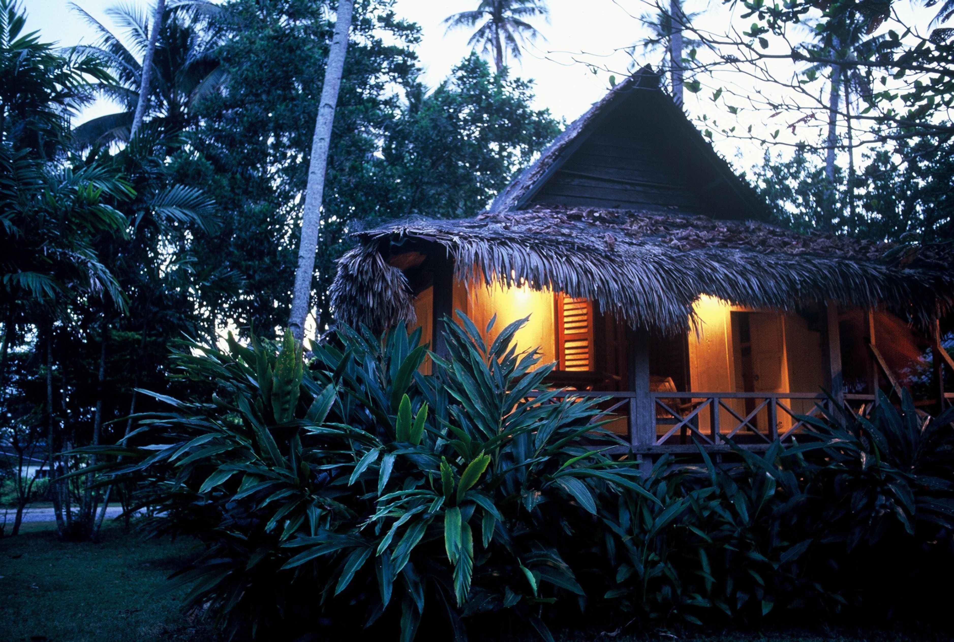 traditional villa (yellow orchid) | front of property – evening/night