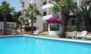 Outdoor pool, pool umbrellas, pool loungers