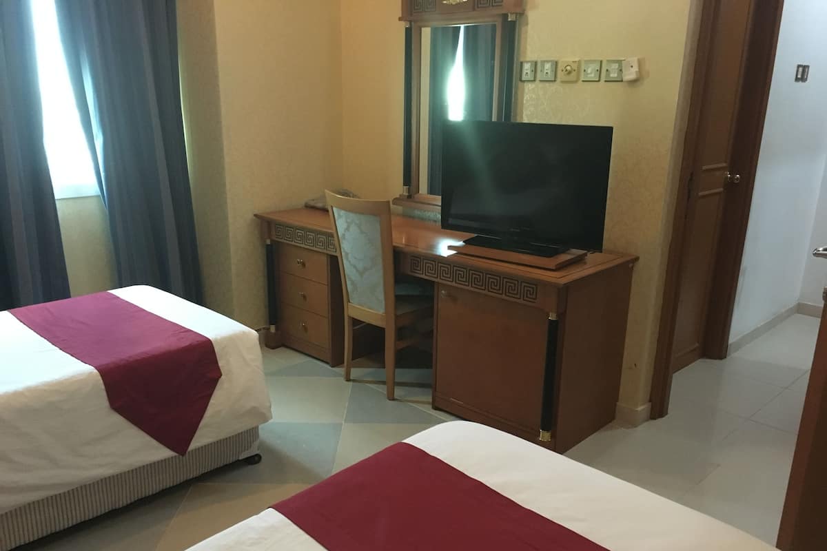 Triple Room | Premium bedding, minibar, in-room safe, desk