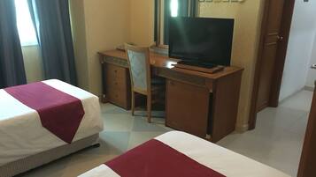 Triple Room | Premium bedding, minibar, in-room safe, desk