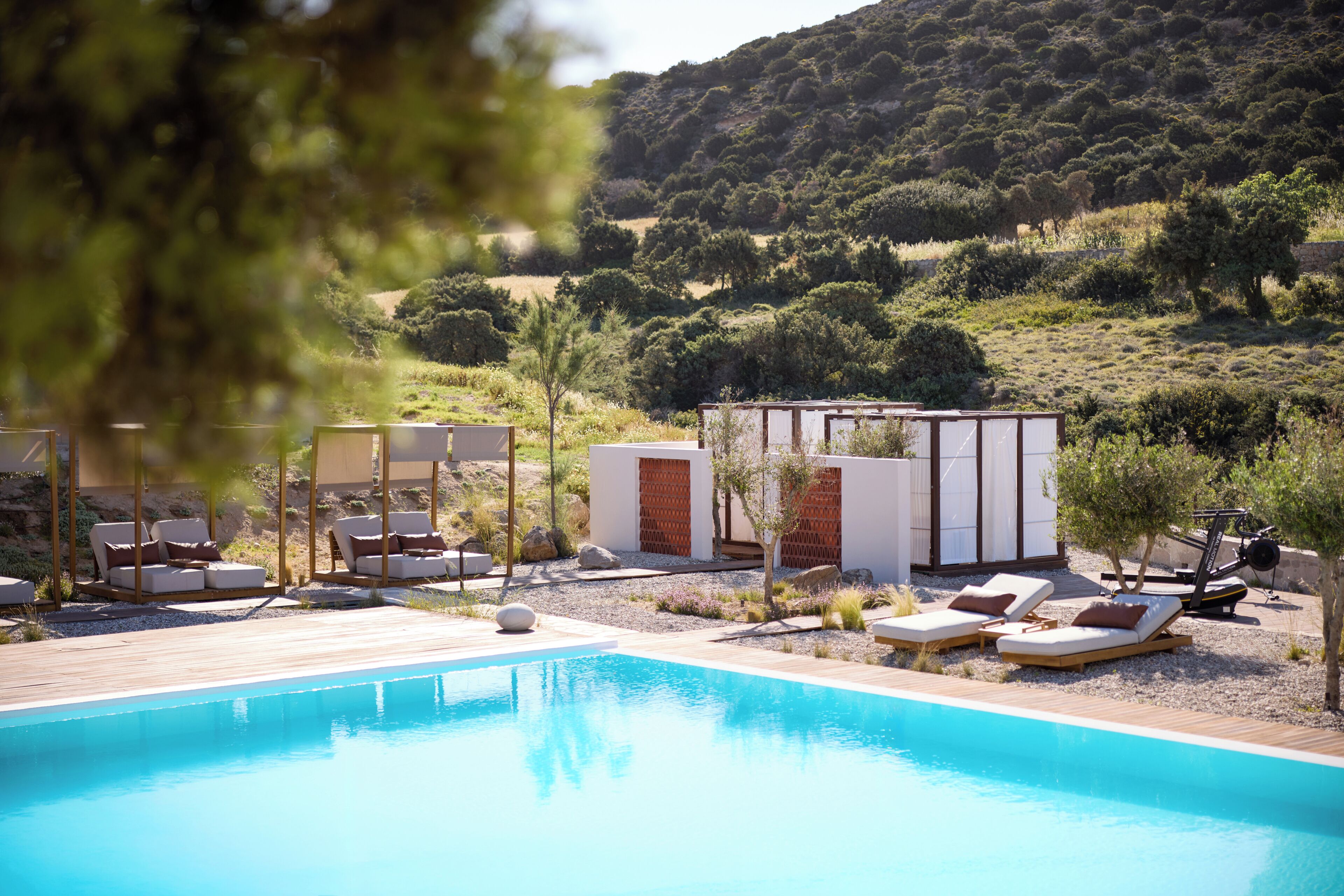 Seasonal outdoor pool, open 11:00 AM to 7:00 PM, pool umbrellas