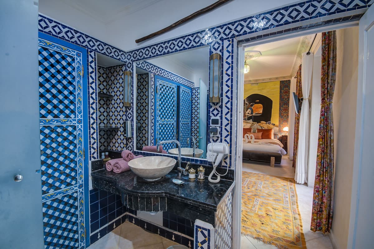 Deluxe Suite | 1 bedroom, premium bedding, in-room safe, blackout drapes