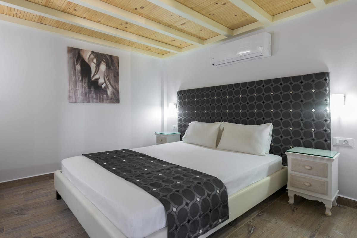 Superior Apartment, 2 Bedrooms | 2 bedrooms, in-room safe, blackout drapes, iron/ironing board