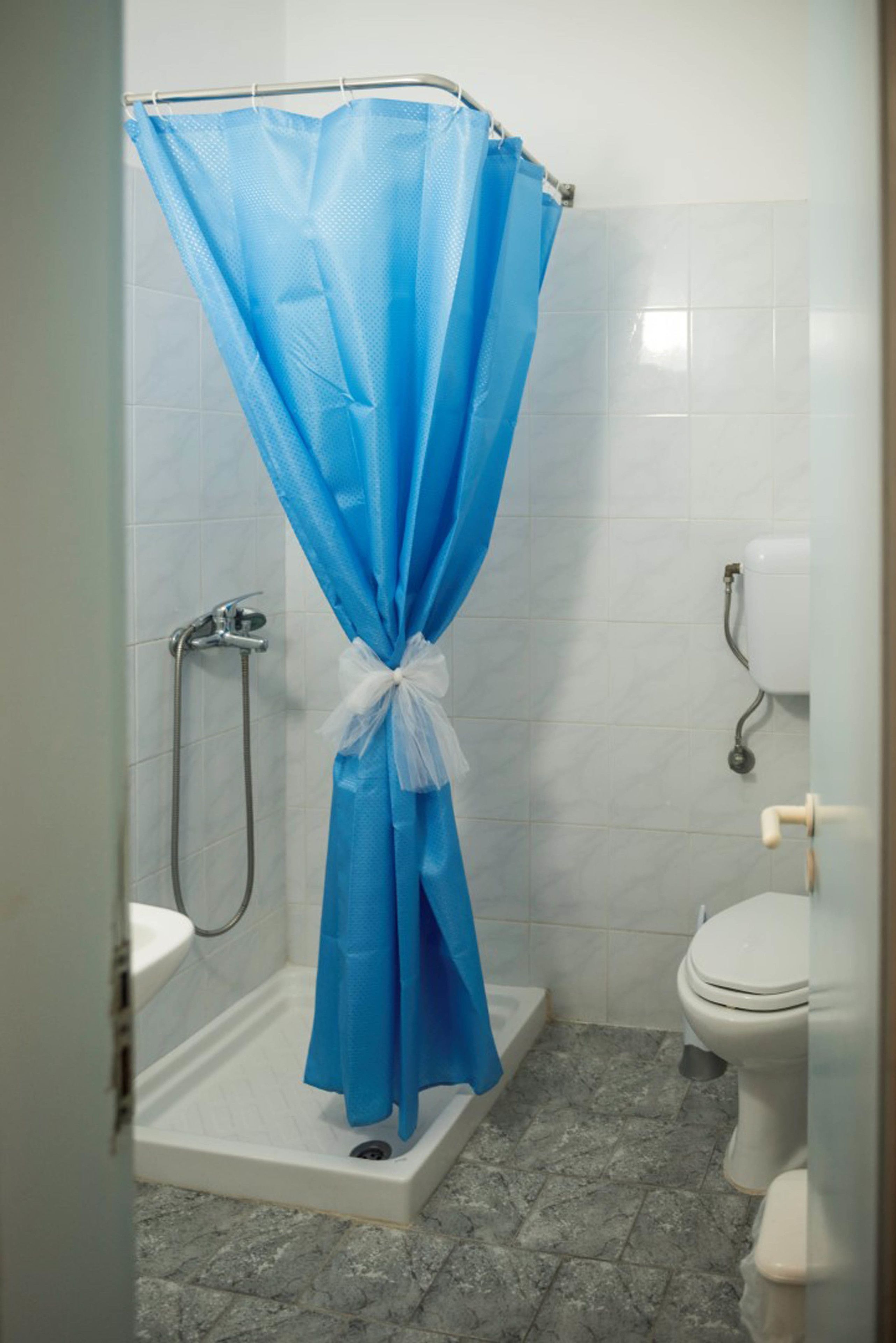 standard studio (for 2) | bathroom | shower, free toiletries, hair dryer, towels