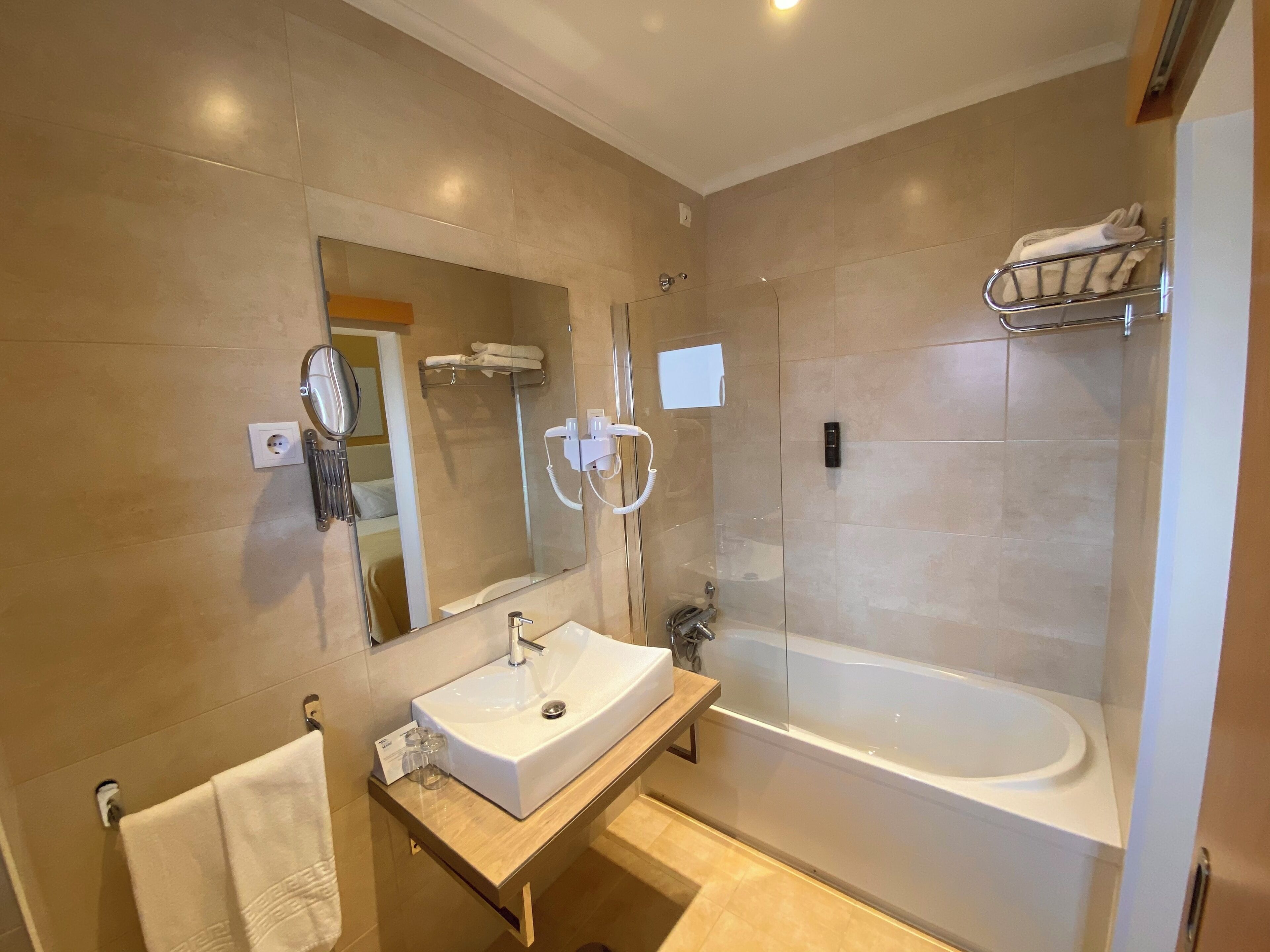 free toiletries, hair dryer, towels, toilet paper