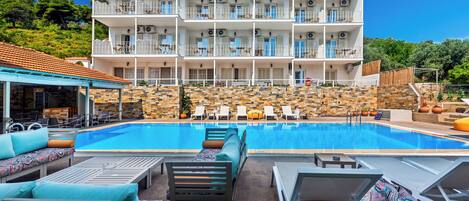 Outdoor pool, pool umbrellas, pool loungers