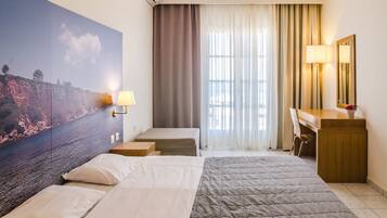 Suite | Ropa de cama de alta calidad y caja de seguridad en la habitación