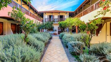 Economy Room, Garden View | Property entrance