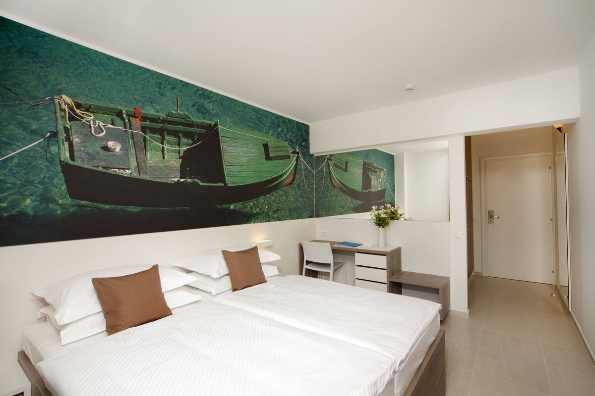Standard Double Room, Balcony | Hypo-allergenic bedding available, in-room safe, desk, blackout drapes
