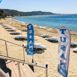 Private beach, free beach cabanas, beach shuttle, sun-loungers