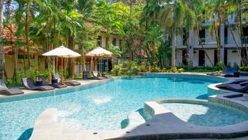 Outdoor pool, pool umbrellas, sun loungers