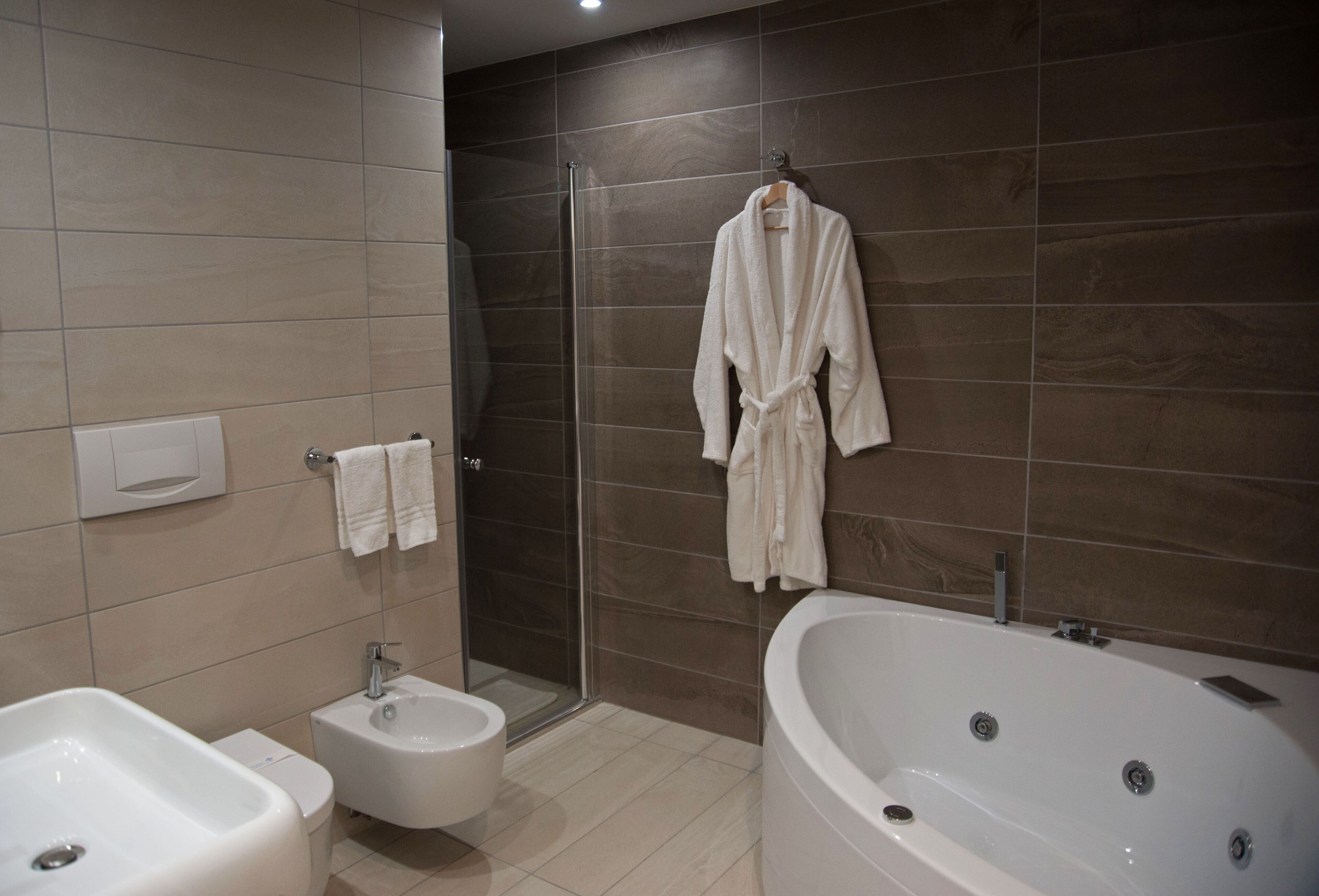 luxury room | bathroom | separate bathtub and shower, jetted bath, free toiletries, hair dryer