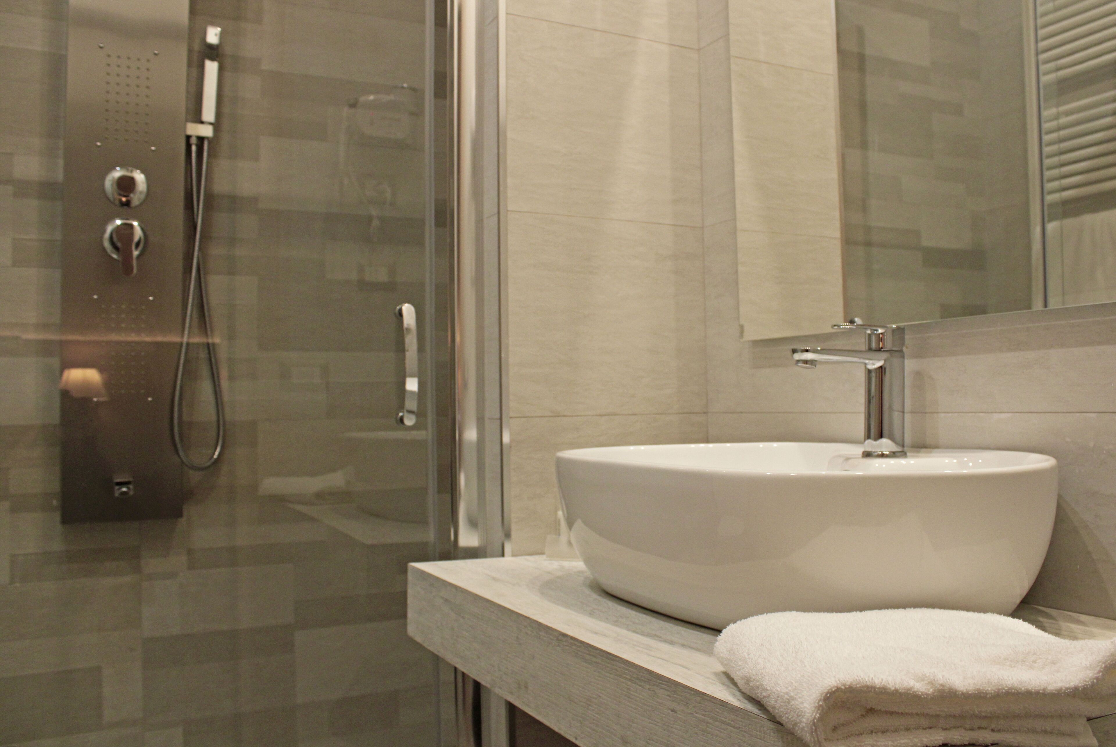 superior single room | bathroom | separate bathtub and shower, jetted bath, free toiletries, hair dryer