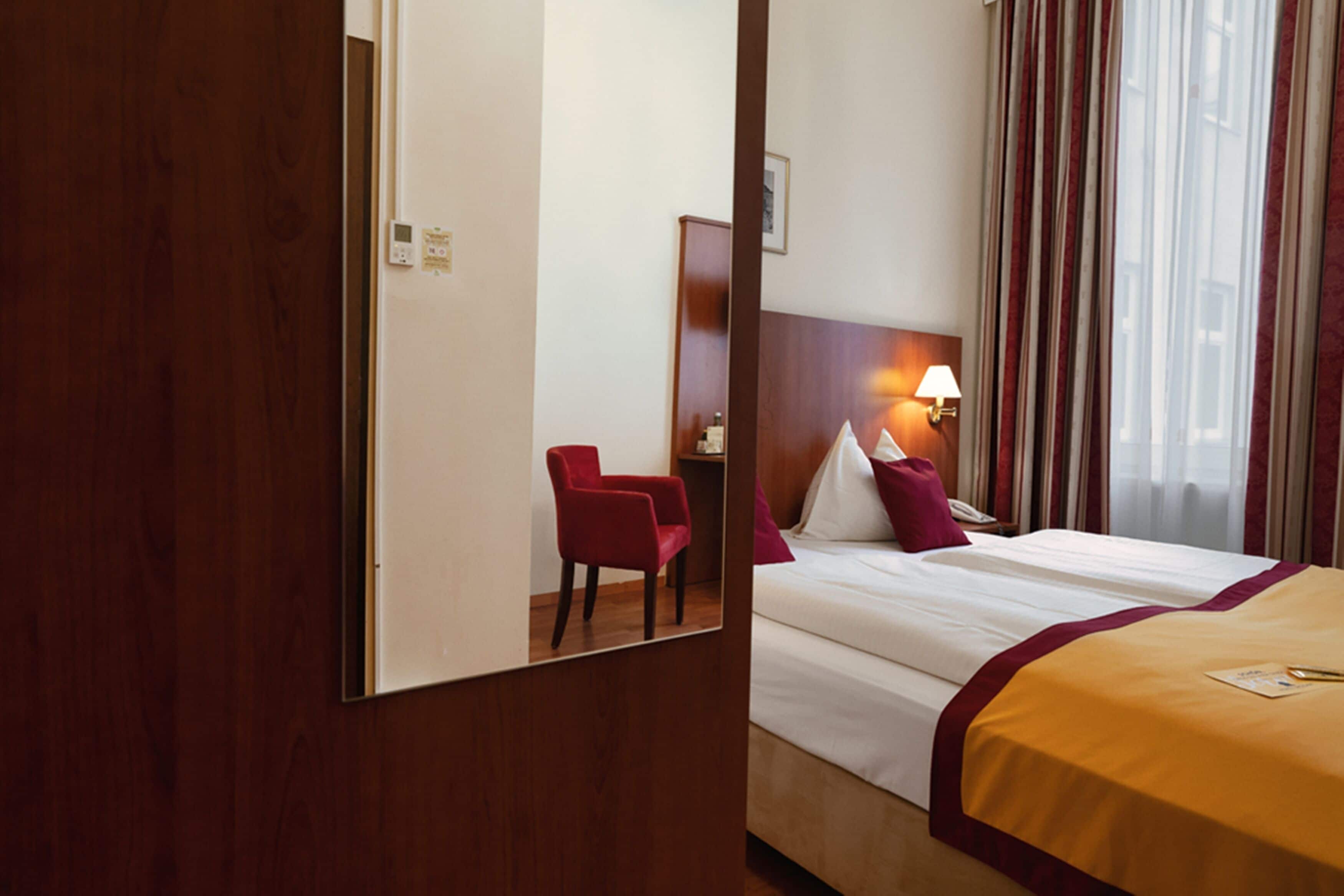 Economy Double Room | Individually furnished, desk, blackout drapes, rollaway beds