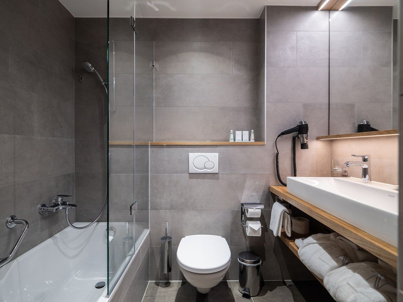 combined shower/bathtub, free toiletries, hair dryer, bathrobes