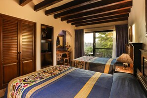 A hotel room with two beds, wooden wardrobe, a desk with a mirror, and a window with curtains. - Hotel Lunata - Near Playa del Carmen Main Beach (Playa del Carmen)