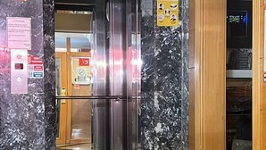 A marble-floored corridor with an elevator and a wooden door leading to a room with visible electrical equipment. - Park Star Hotel Taksim (Istanbul)
