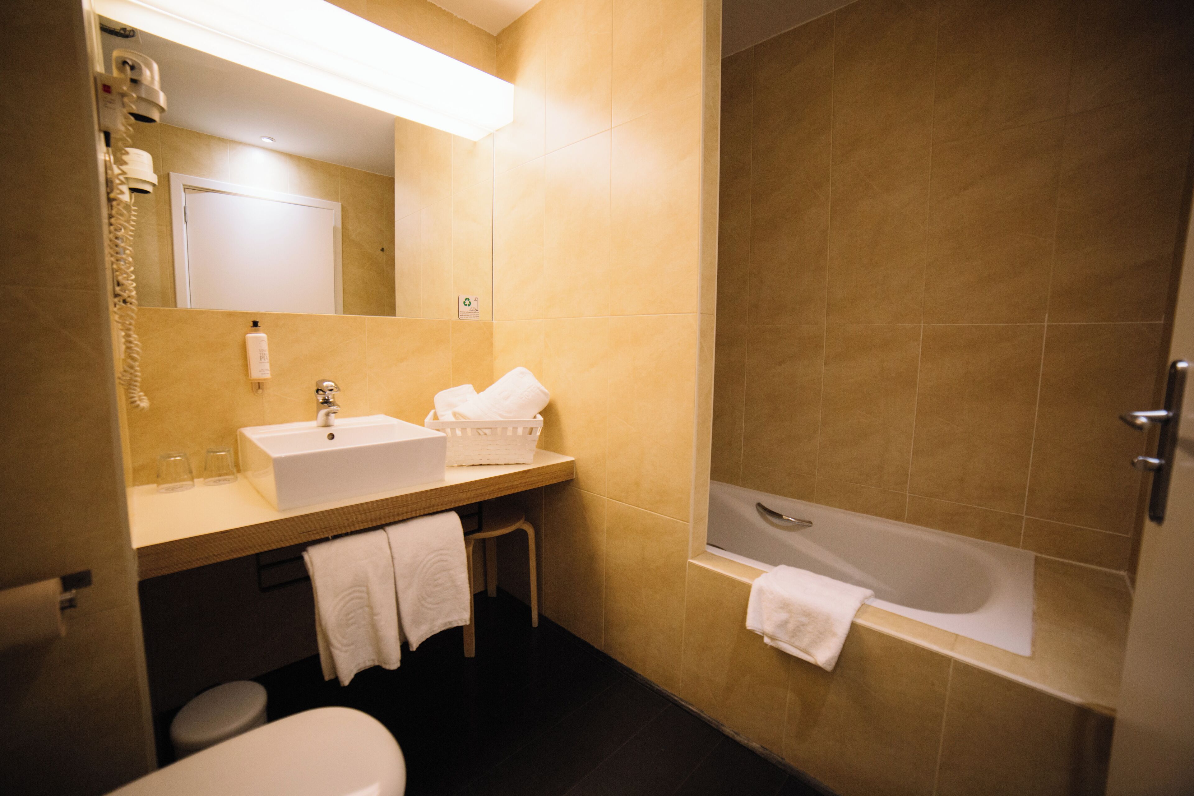 Hair dryer, towels, soap, shampoo