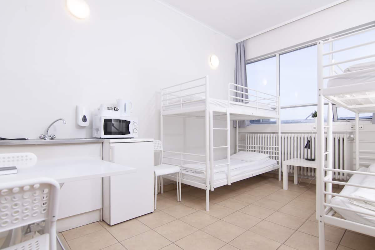 Standard Quadruple Room, Shared Bathroom | Premium bedding, pillowtop beds, individually decorated