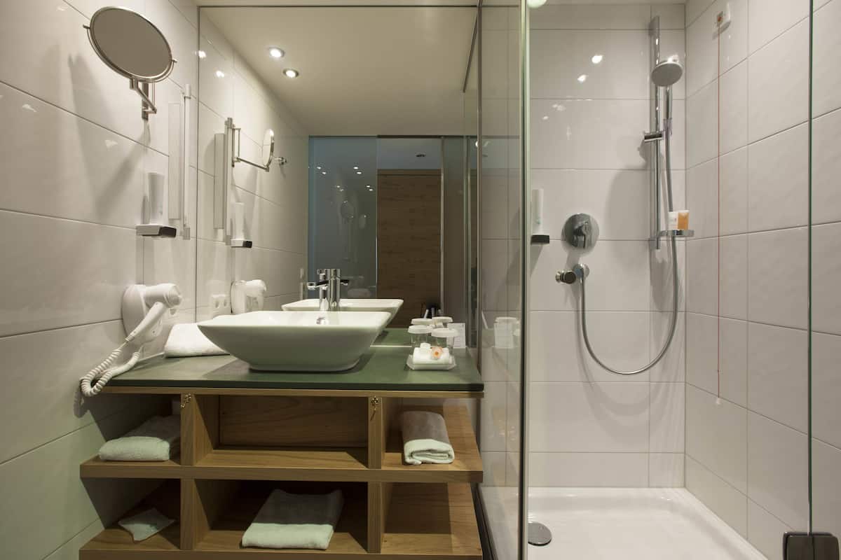 shower, designer toiletries, hair dryer, bathrobes