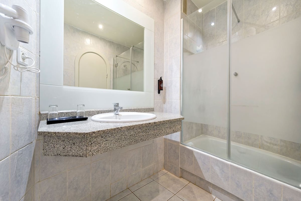 Hair dryer, towels, soap, toilet paper