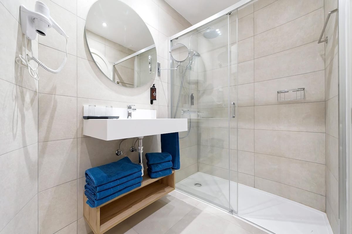Hair dryer, towels, soap, toilet paper