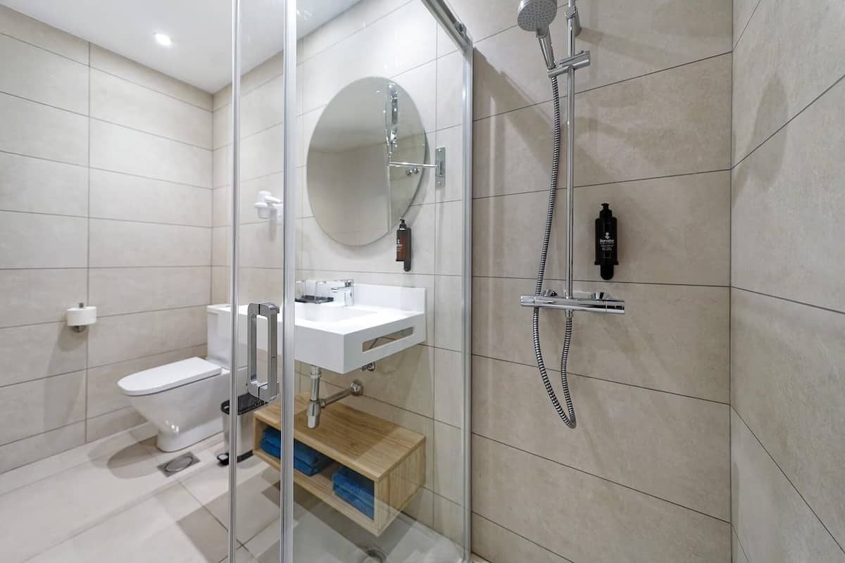 Hair dryer, towels, soap, toilet paper