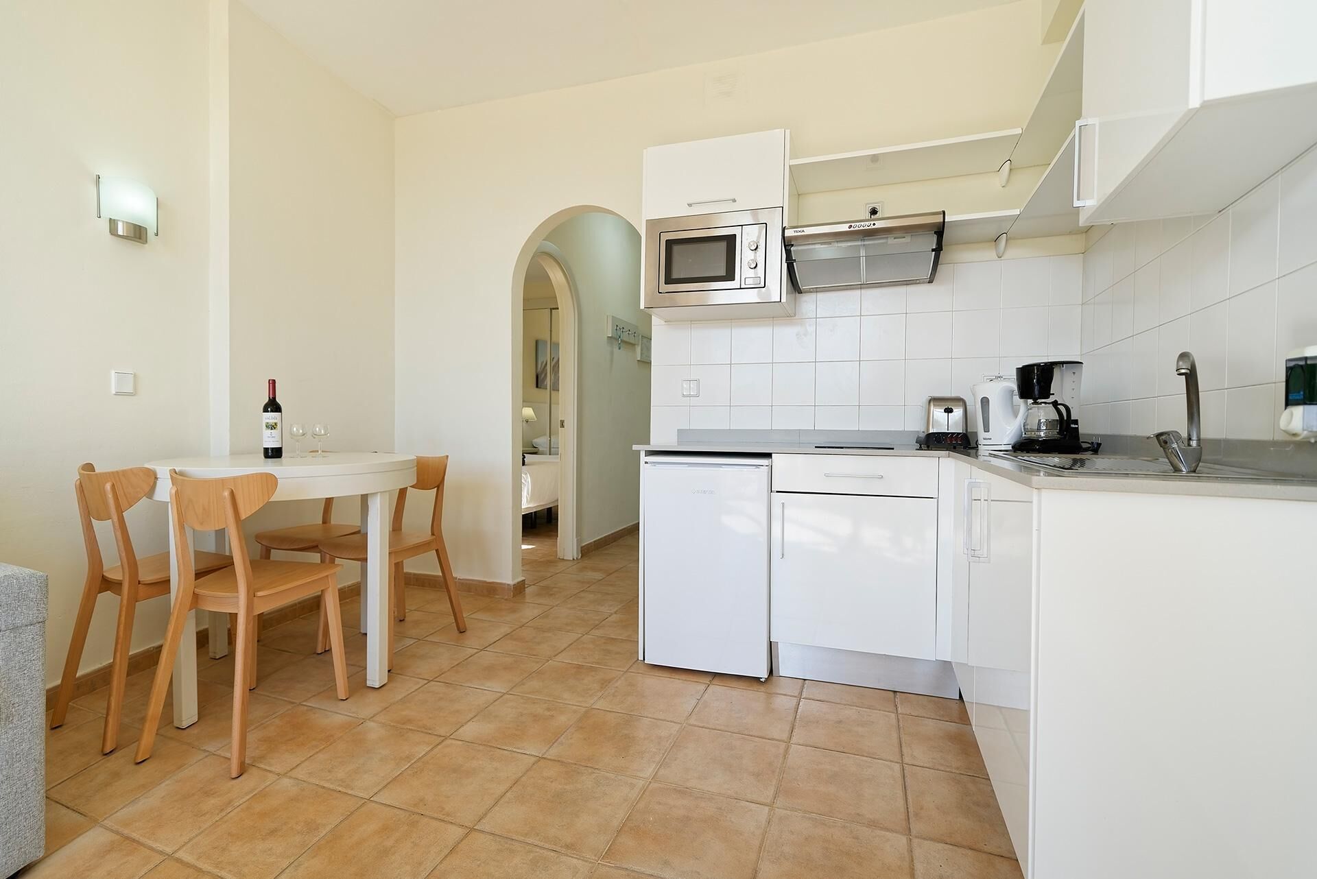 Full-size fridge, microwave, stovetop, toaster