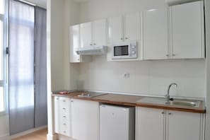 Departamento, vista parcial al mar | Cocina privada
