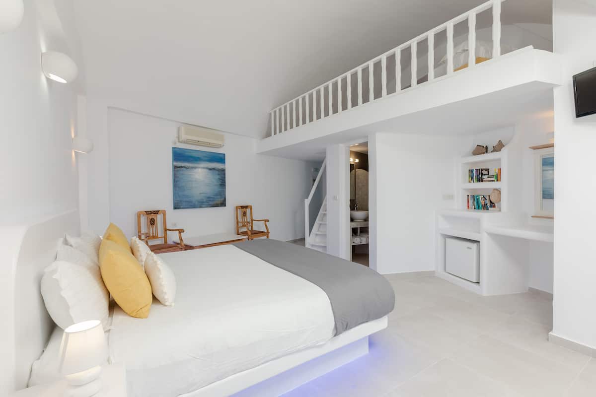 superior room, 1 queen bed, sea view | in-room safe, individually decorated, desk, blackout curtains