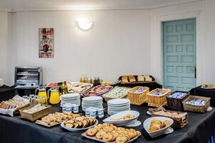 Breakfast, lunch, dinner served; local cuisine 