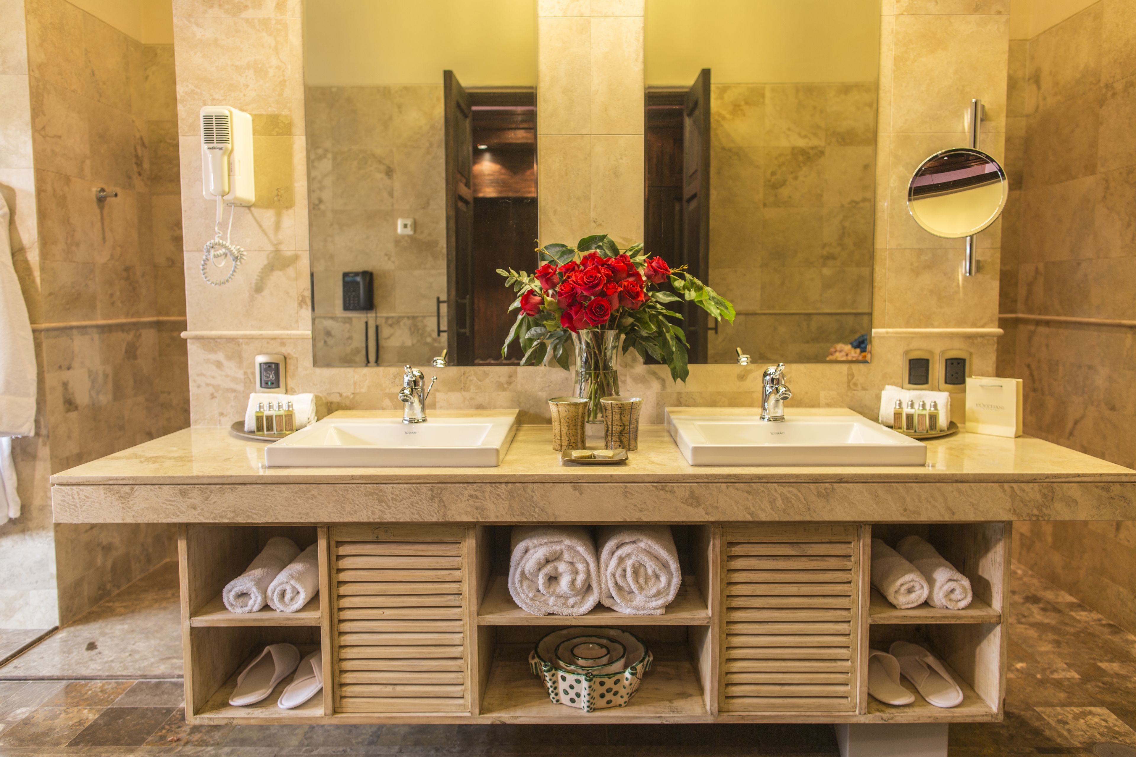 designer toiletries, hair dryer, bathrobes, towels