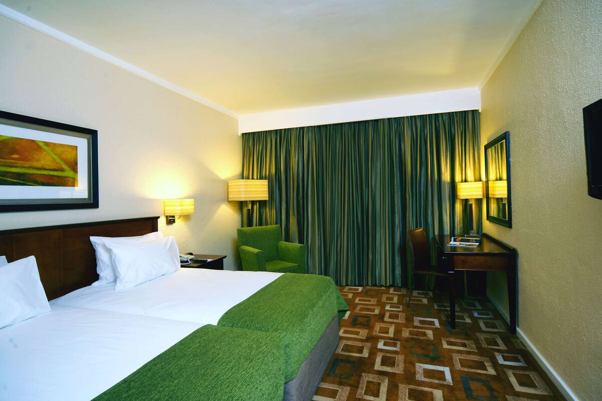 In-room safe, desk, laptop workspace, blackout curtains