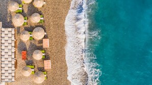 Unclassified image, 3 of 91, button - Kokkari Beach (Samos)