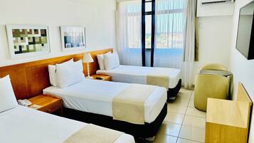 Triple Room | Premium bedding, minibar, in-room safe, desk