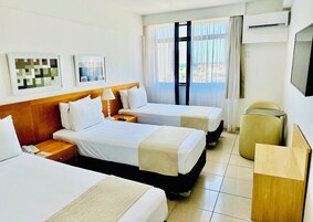 Ropa de cama de alta calidad y minibar 