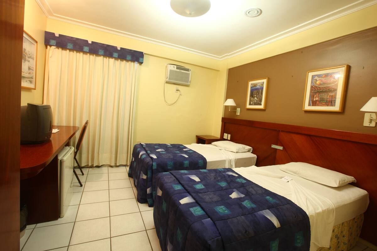 Standard Twin Room, 2 Twin Beds | Minibar, in-room safe, desk, blackout drapes