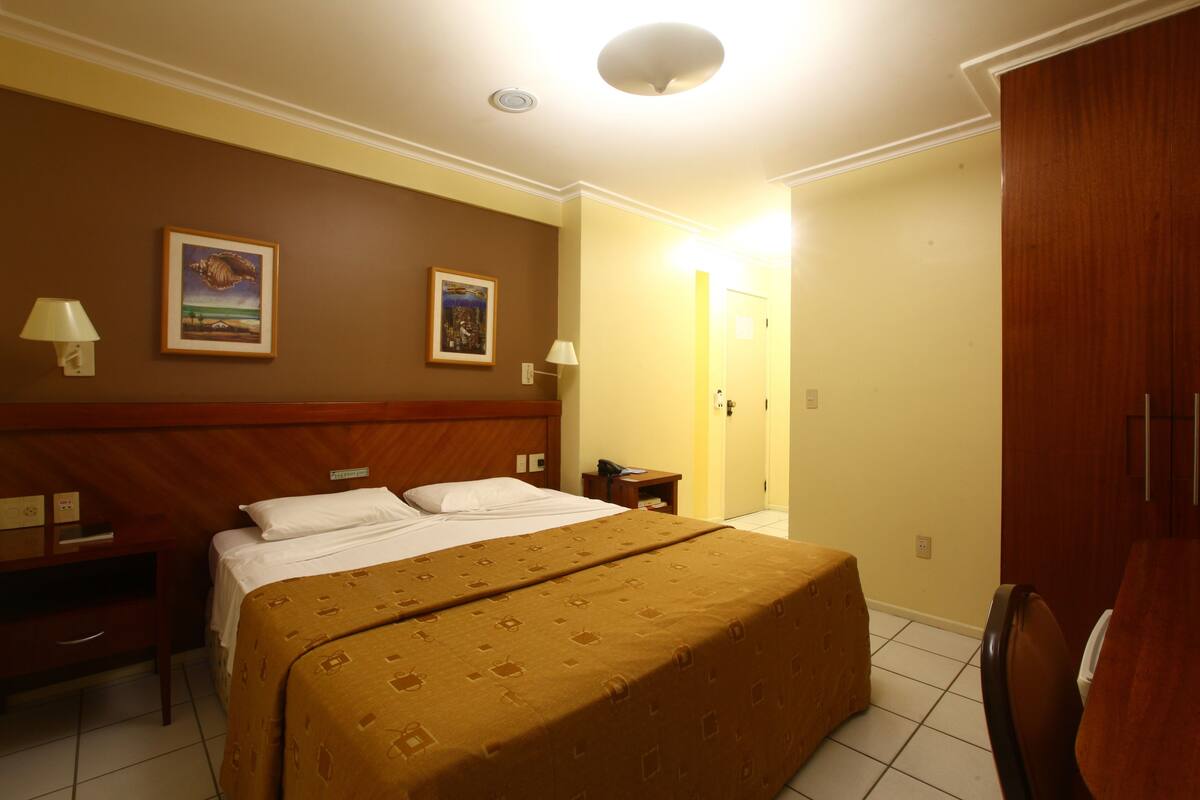 Standard Double Room | Minibar, in-room safe, desk, blackout drapes