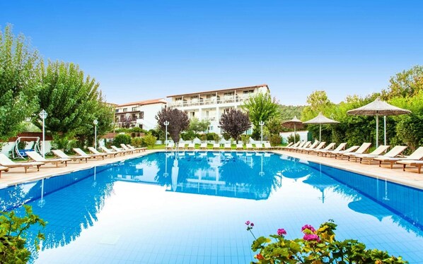 Outdoor pool, pool umbrellas, pool loungers