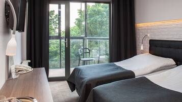 Deluxe Double Room, River View | In-room safe, desk, iron/ironing board, cribs/infant beds