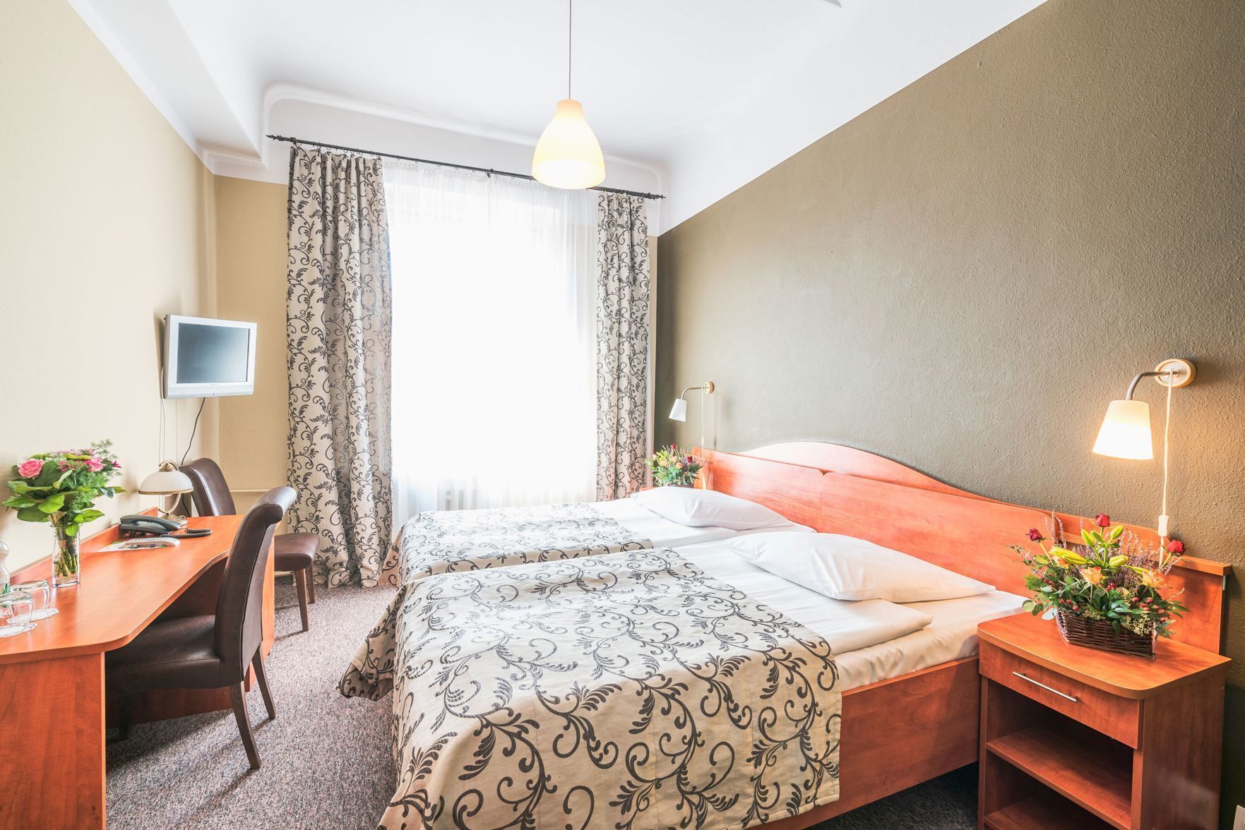 Desk, iron/ironing board, free cribs/infant beds, rollaway beds