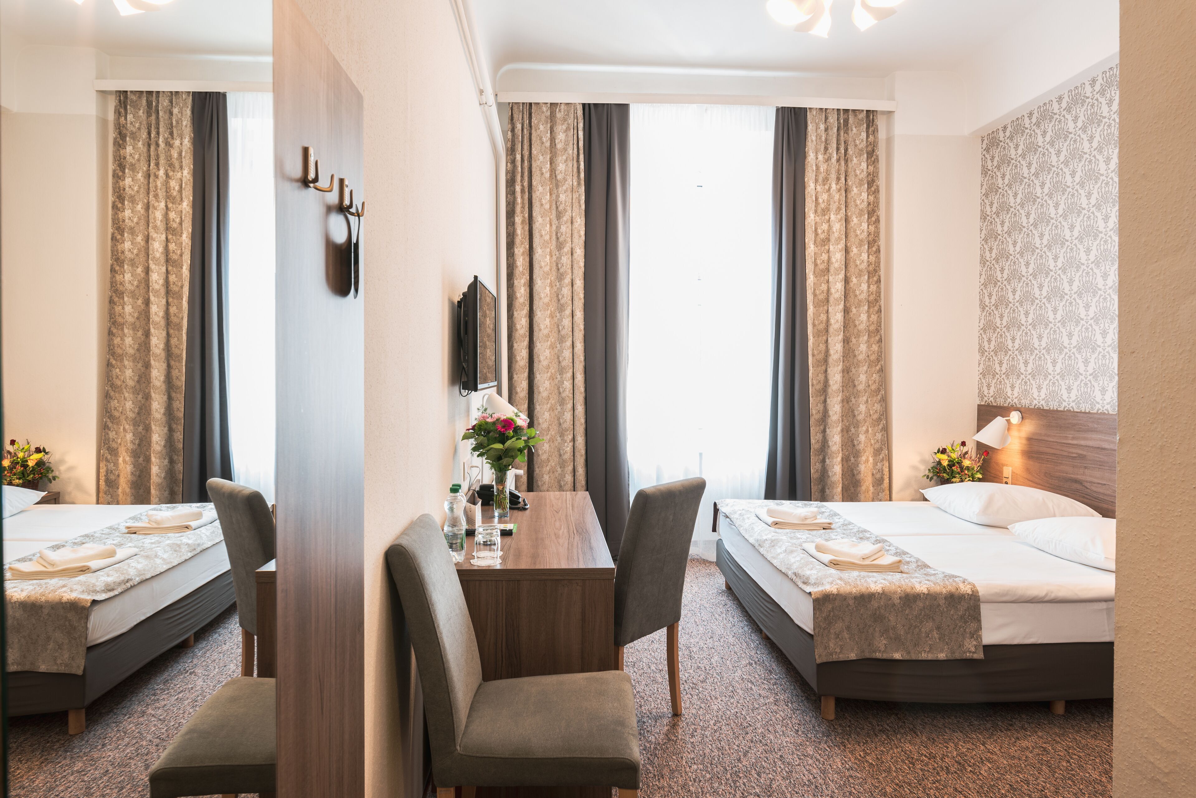 Desk, iron/ironing board, free cribs/infant beds, rollaway beds