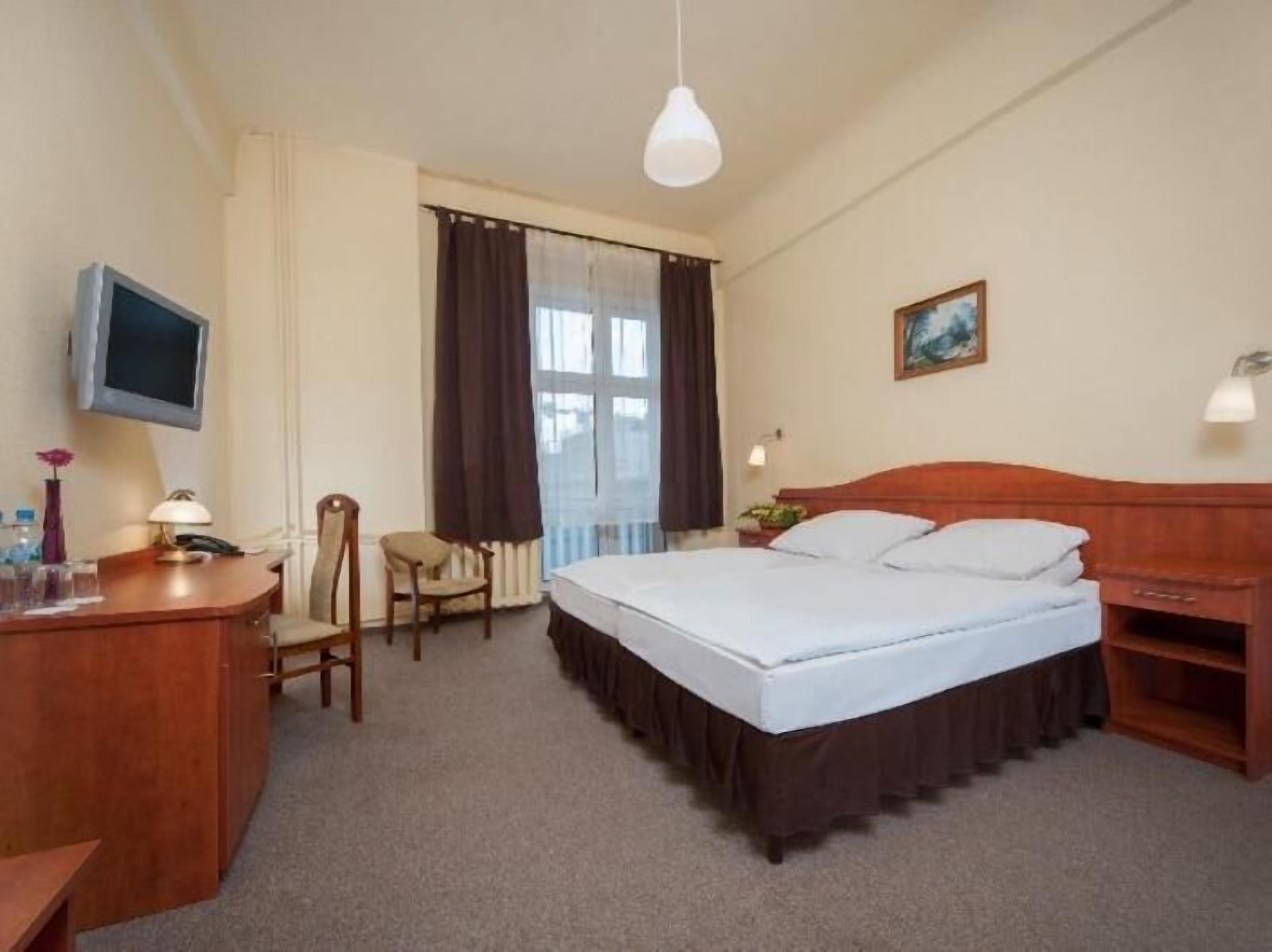 Desk, iron/ironing board, free cribs/infant beds, rollaway beds