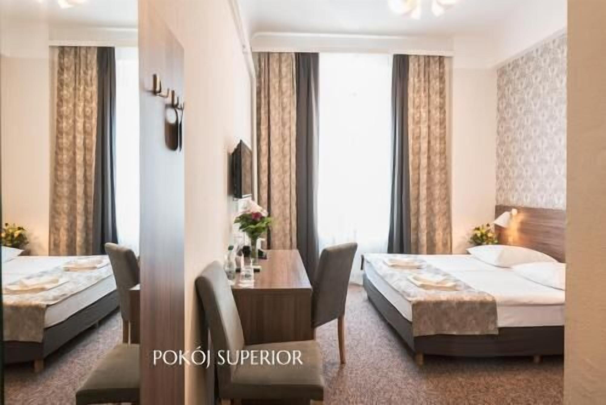 Desk, iron/ironing board, free cribs/infant beds, rollaway beds